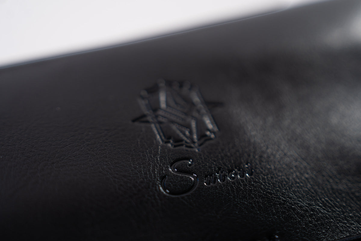 Sutori logo embossed on the double leather case