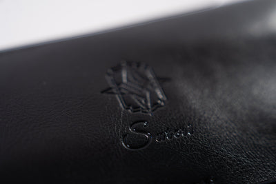 Sutori logo embossed on the double leather case
