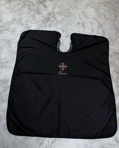 Sutori barber cape laid flat