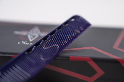 Sutori name printed on the purple cutting comb 